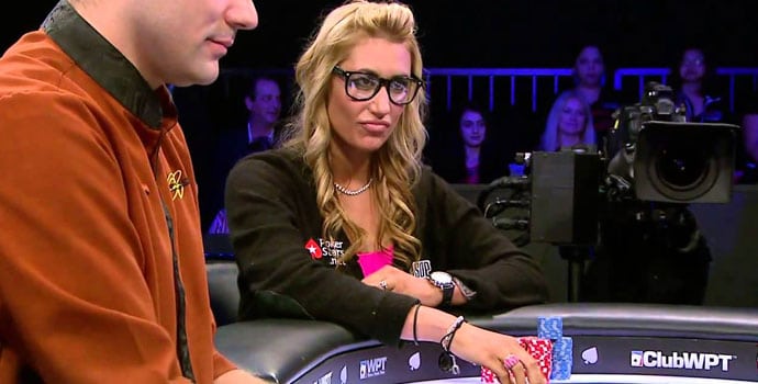 Vanessa Rousso at the Head's up table wearing a poker stars jumper